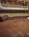 Crawl space drainage matting installed in a home in Lodge Grass