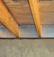 SilverGlo™ insulation installed in a floor joist in Lame Deer
