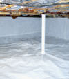 A sealed crawl space in Roundup with a vapor barrier