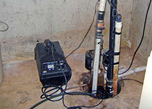 Pedestal sump pump system installed in a home in Crow Agency