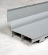 A closeup of our FlowGuard drain system for wet basements in Bridger.