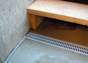 a hatchway entrance in White Sulphur Springs that has been protected from flooding by our TrenchDrain basement drainage system.