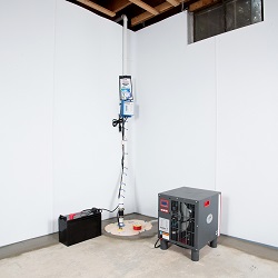 Sump pump system, dehumidifier, and basement wall panels installed during a sump pump installation in Colstrip