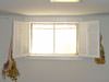 covered window wells for homes in Busby